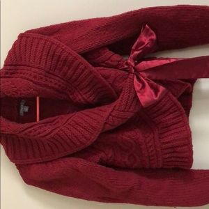 Red tie up sweater